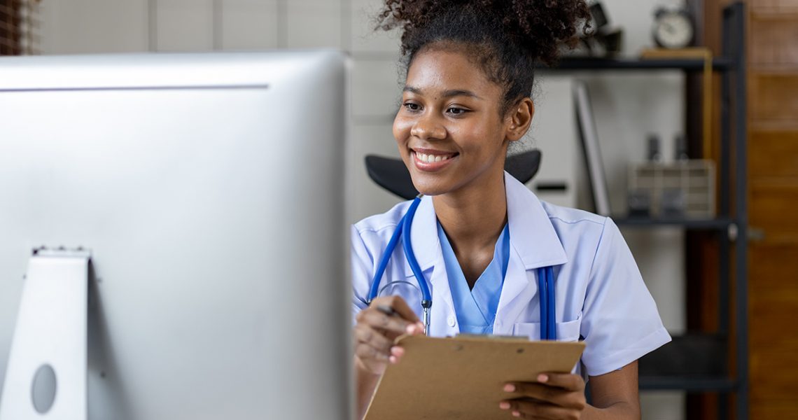 An American female doctor works in a hospital office, she is a general practitioner and internal medicine patient, treating diseases by a female physician. Medical concept and treatment.